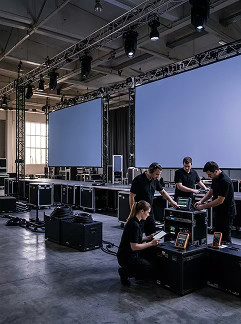 Technical crew building the stage structure for an event